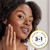Model applying Olay Complete + Hydrating Lotion to face. 3 in 1 nourish, renew, strengthen.
