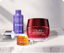 Group of Olay products posed on a white marble countertop