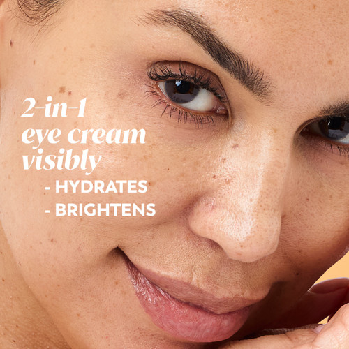 Model posing. 2 in 1 eye cream visibly hydrates, brightens