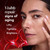 Model posing using Regenerist Eye Wrinkle Correcting Treatment on face. Visibly repair signs of aging. Lifts tightens brightens