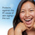 Model posing and smiling. Protects against the #1 cause of skin aging. The sun.