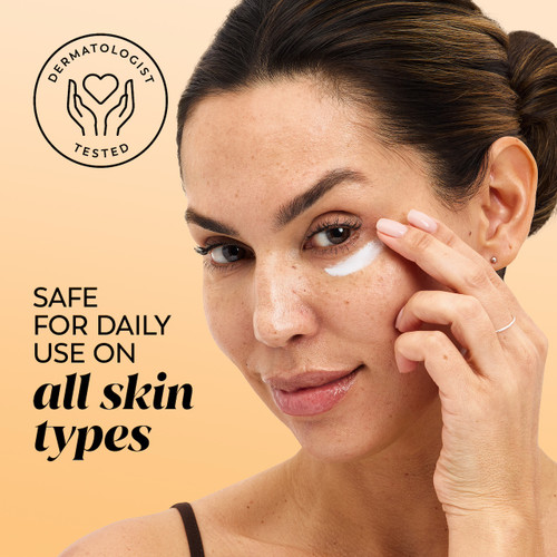 Model applying eye cream under eye. Safe for daily use on all skin types. Dermatologist tested.