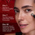 Model posing using Regenerist Eye Wrinkle Correcting Treatment on face. Day 1 eye area is instantly brighter and hydrated. Day 7 eye area appears more lifted, tighter and smoother. Day 28 expression lines and deeper set wrinkles around the eyes are visibly reduced.