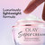 Model dabbing fingers in Olay Super Cream. Luxuriously lightweight formula