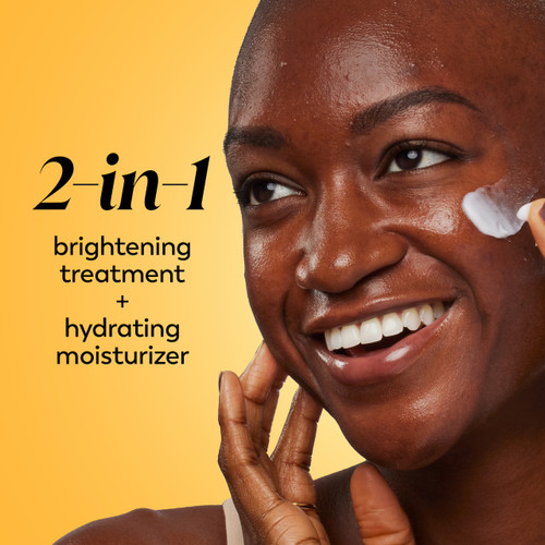 Model posing and smiling applying Olay Vitamin C Lightweight Hydrating Moisturizer  to face. 2 in 1 brightening treatment plus hydrating moisturizer