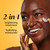 Model posing and smiling applying Olay Vitamin C Lightweight Hydrating Moisturizer  to face. 2 in 1 brightening treatment plus hydrating moisturizer