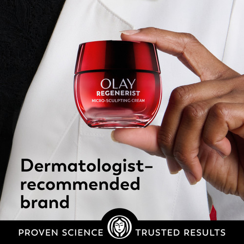 Model holding New Regenerist Micro-Sculpting Cream Moisturizer jar. Dermatologist recommended brand. Proven Science, trusted results.